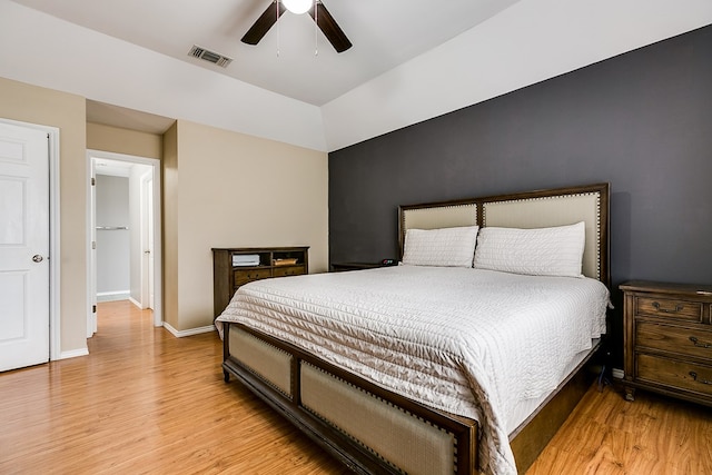 bedroom featuring light wood-type flooring and ceiling fan