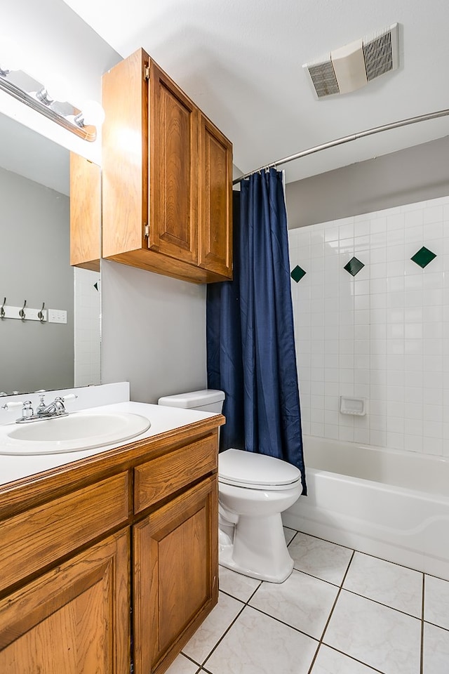 full bathroom featuring shower / bath combination with curtain, tile patterned floors, toilet, and vanity