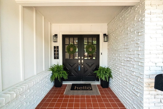 2301 Sul Ross St, San Angelo, TX 76904 - view of exterior entry with brick siding and french doors