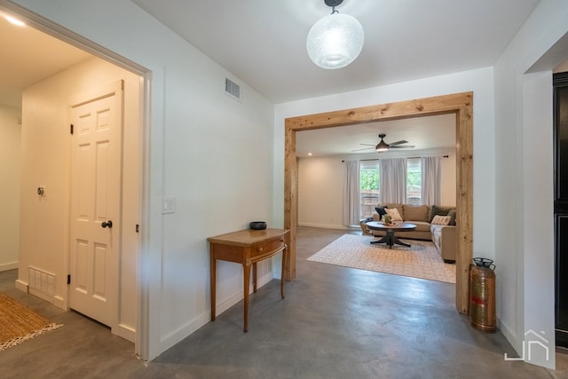 2301 Sul Ross St, San Angelo, TX 76904 - hall featuring visible vents, finished concrete flooring, and baseboards