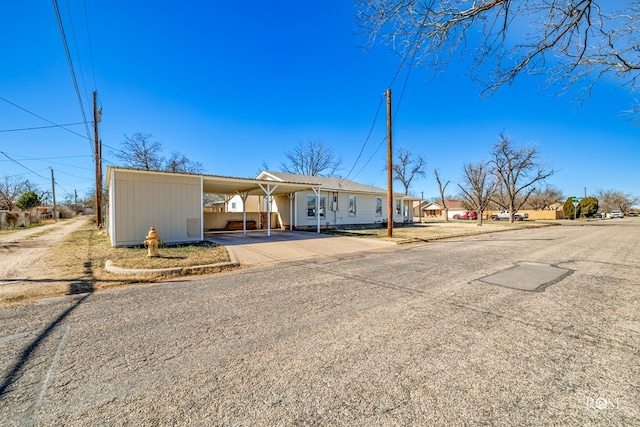 view of front of home featuring a carport