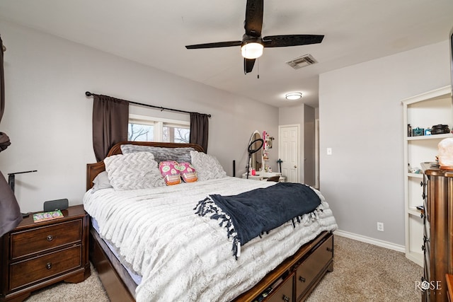 carpeted bedroom with ceiling fan