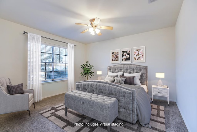 carpeted bedroom with ceiling fan and baseboards