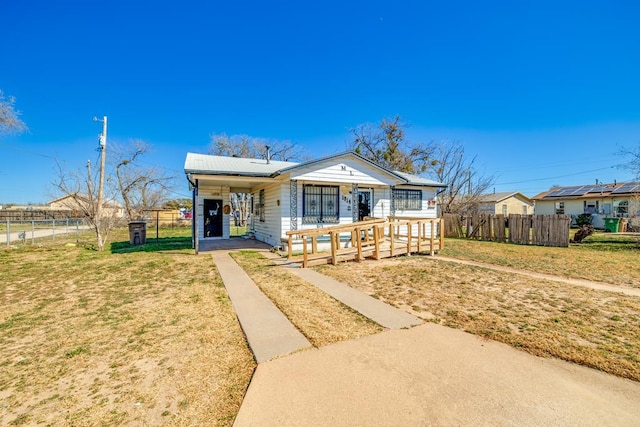 view of front of home with a front lawn and covered porch