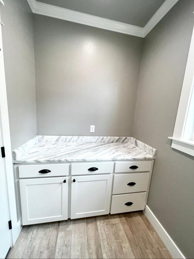 1958 Beaty Rd, San Angelo, TX 76904 - detailed view of wood finished floors, crown molding, and baseboards