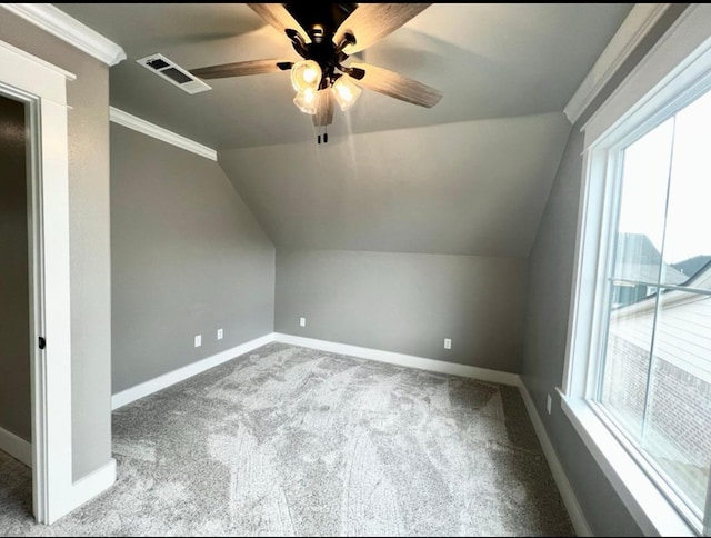 1958 Beaty Rd, San Angelo, TX 76904 - additional living space featuring vaulted ceiling, plenty of natural light, a ceiling fan, carpet flooring, and baseboards