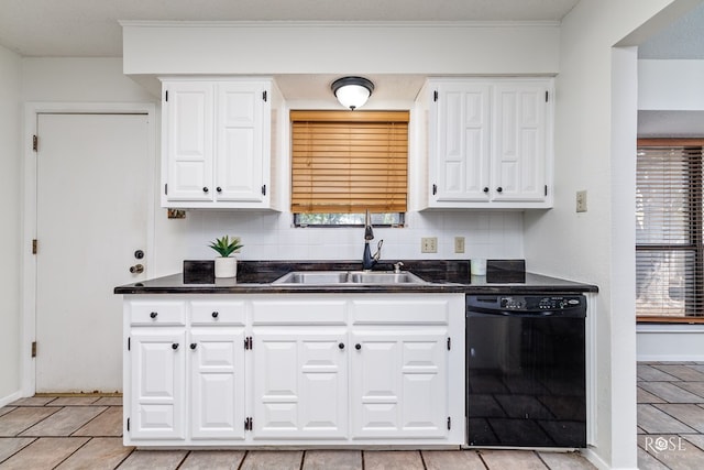 1216 Ricks Ct, San Angelo, TX 76905 - kitchen with dishwasher, a sink, dark countertops, white cabinetry, and tasteful backsplash