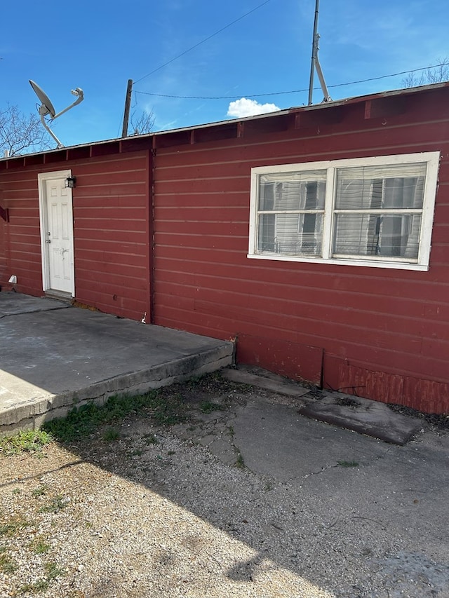 view of home's exterior with a patio