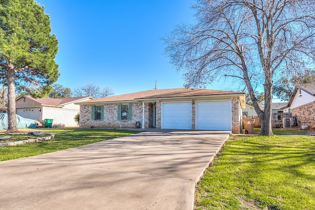 view of front of property with a front lawn, an attached garage, brick siding, and concrete driveway