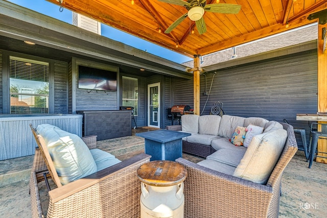 view of patio featuring ceiling fan and an outdoor living space