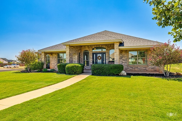 view of front facade with a front yard