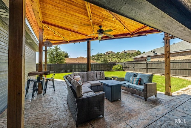 view of patio / terrace featuring an outdoor living space and ceiling fan