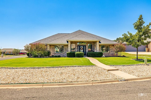 view of front of home featuring a front lawn