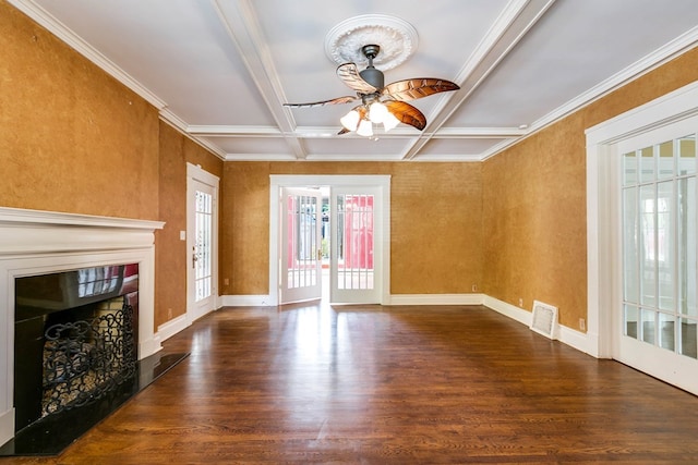 unfurnished living room with hardwood / wood-style flooring, ceiling fan, coffered ceiling, ornamental molding, and beamed ceiling