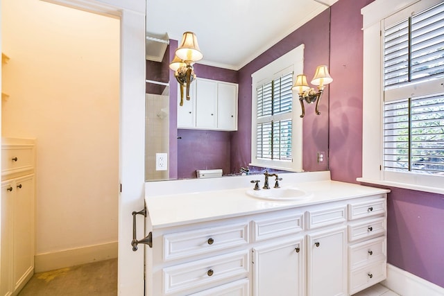 bathroom featuring ornamental molding, vanity, toilet, and a wealth of natural light