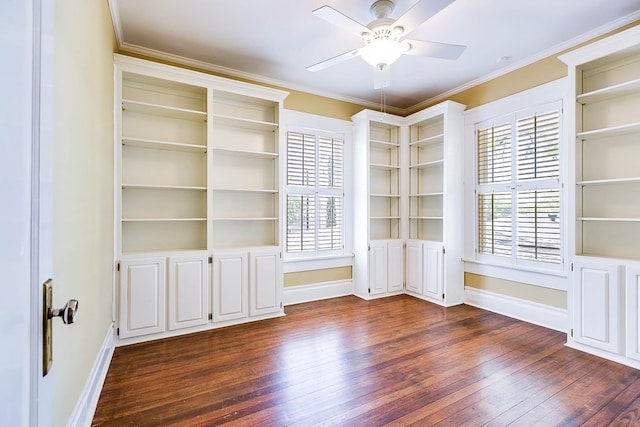 unfurnished room featuring crown molding, ceiling fan, and dark hardwood / wood-style flooring