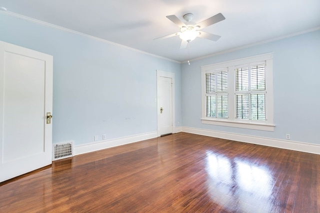 unfurnished room featuring hardwood / wood-style flooring, ornamental molding, and ceiling fan