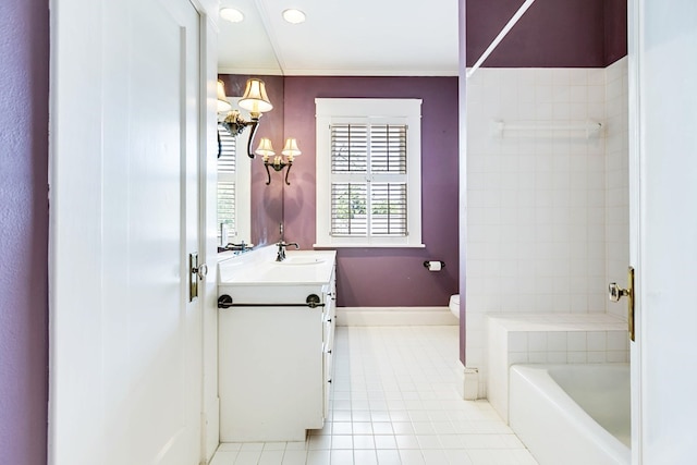 bathroom featuring vanity, toilet, a bathing tub, and tile patterned flooring