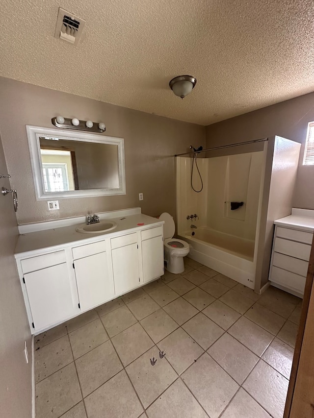 full bathroom with vanity, tile patterned flooring, bathing tub / shower combination, and a textured ceiling