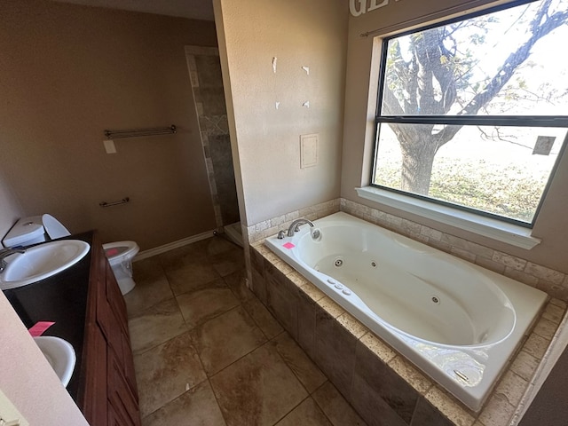 full bathroom featuring tile patterned flooring, vanity, independent shower and bath, and toilet