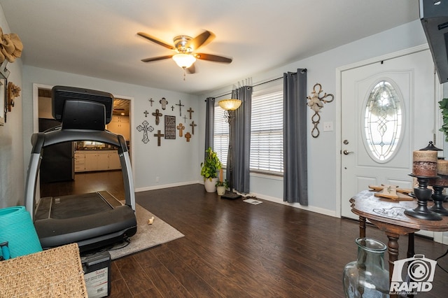 interior space featuring dark hardwood / wood-style floors and ceiling fan