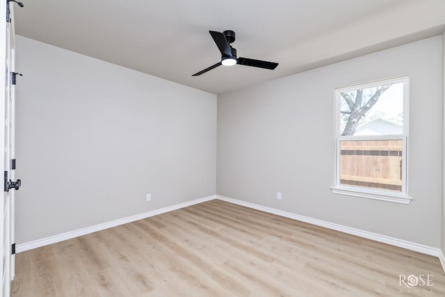 spare room featuring ceiling fan and light hardwood / wood-style floors