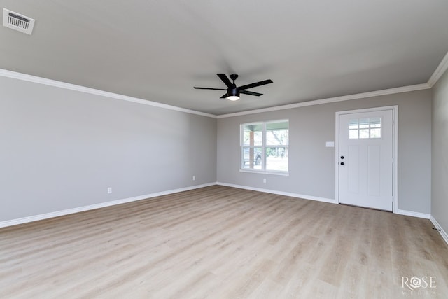 interior space with crown molding, ceiling fan, and light hardwood / wood-style flooring