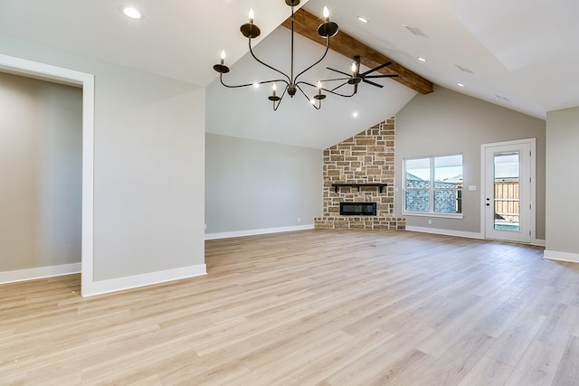 unfurnished living room featuring high vaulted ceiling, a fireplace, ceiling fan with notable chandelier, beamed ceiling, and light wood-type flooring