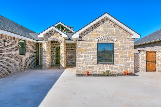 view of front of house featuring a patio