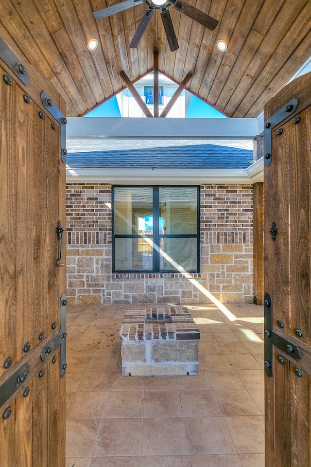 entrance to property with ceiling fan