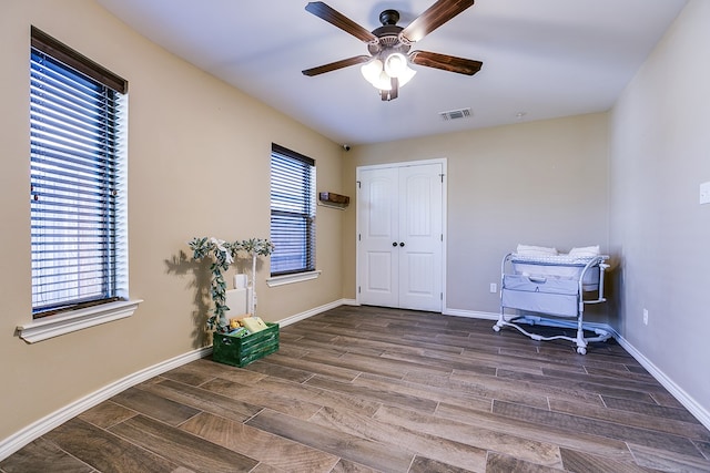 interior space featuring a wealth of natural light and ceiling fan