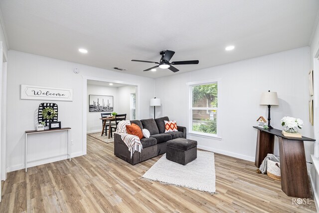 935 E 40th St, San Angelo, TX 76903 - living area featuring light wood finished floors, ceiling fan, and recessed lighting