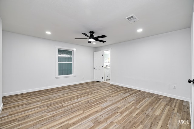 935 E 40th St, San Angelo, TX 76903 - empty room featuring ceiling fan, wood finished floors, and recessed lighting
