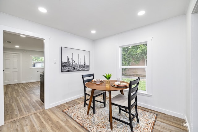 935 E 40th St, San Angelo, TX 76903 - dining room with light wood-type flooring, recessed lighting, and ornamental molding