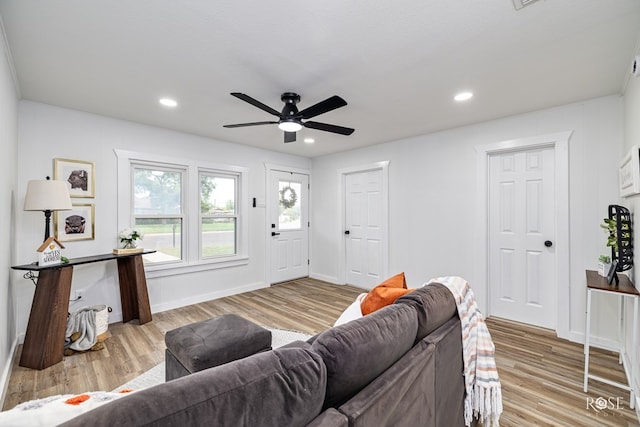935 E 40th St, San Angelo, TX 76903 - living room with ceiling fan, wood finished floors, and recessed lighting