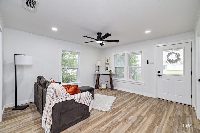 935 E 40th St, San Angelo, TX 76903 - living area featuring light wood finished floors, healthy amount of natural light, a ceiling fan, and recessed lighting