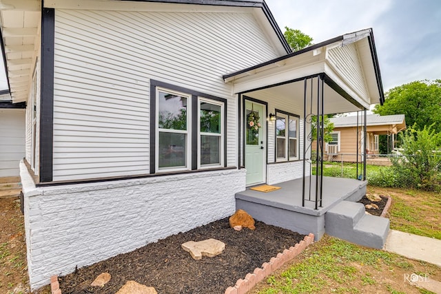 935 E 40th St, San Angelo, TX 76903 - view of side of home featuring a porch