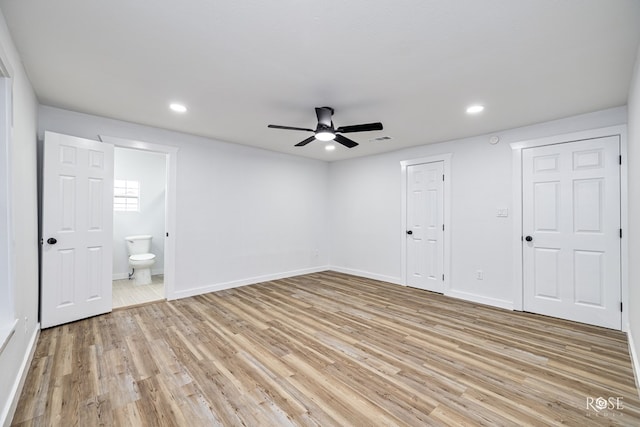935 E 40th St, San Angelo, TX 76903 - unfurnished bedroom with light wood-type flooring, recessed lighting, connected bathroom, and a ceiling fan