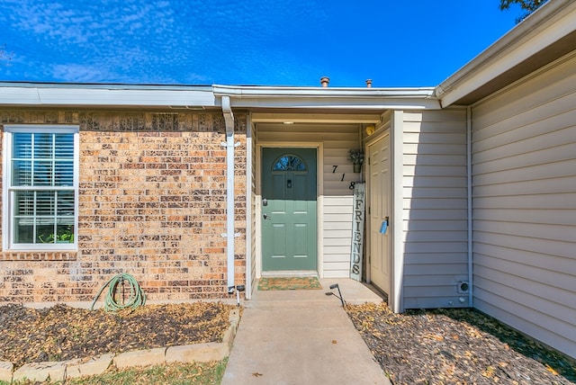 718 E 45th St, San Angelo, TX 76903 - entrance to property with brick siding