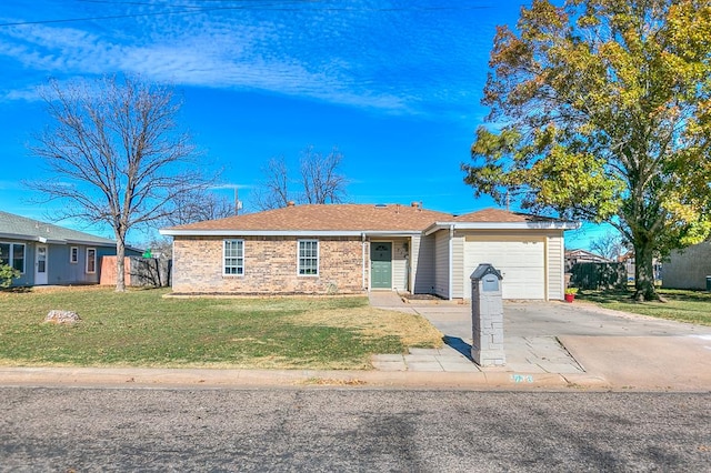 718 E 45th St, San Angelo, TX 76903 - single story home featuring driveway and an attached garage