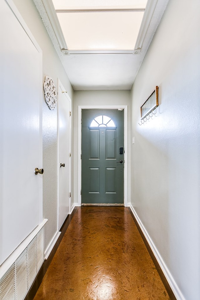 718 E 45th St, San Angelo, TX 76903 - doorway to outside with finished concrete floors and baseboards