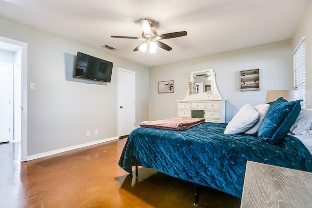 718 E 45th St, San Angelo, TX 76903 - bedroom featuring finished concrete floors and a ceiling fan