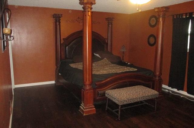 bedroom featuring dark hardwood / wood-style floors