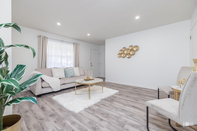 286 Mockingbird Ln, San Angelo, TX 76901 - living room featuring light wood-style flooring, recessed lighting, and baseboards