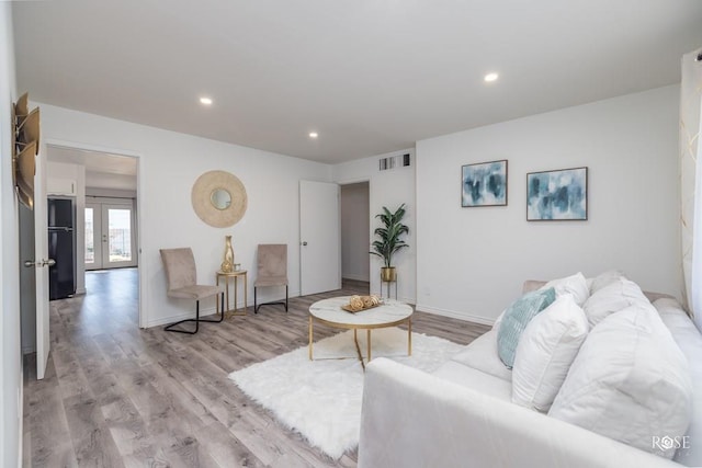 286 Mockingbird Ln, San Angelo, TX 76901 - living room with wood finished floors, recessed lighting, and baseboards