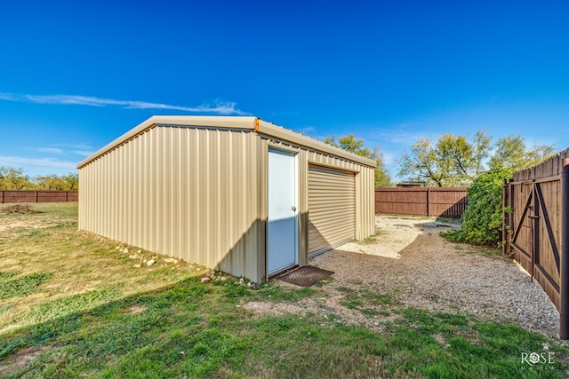 view of outdoor structure with a yard