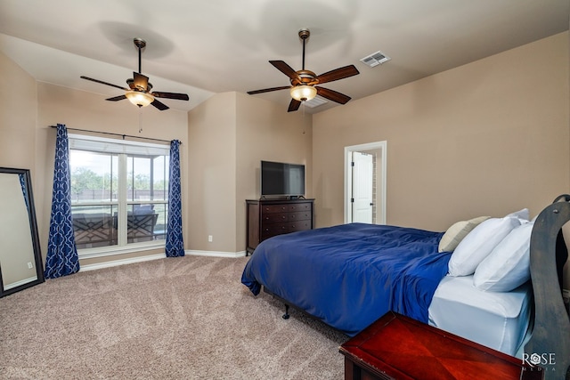 bedroom with vaulted ceiling, ceiling fan, and carpet