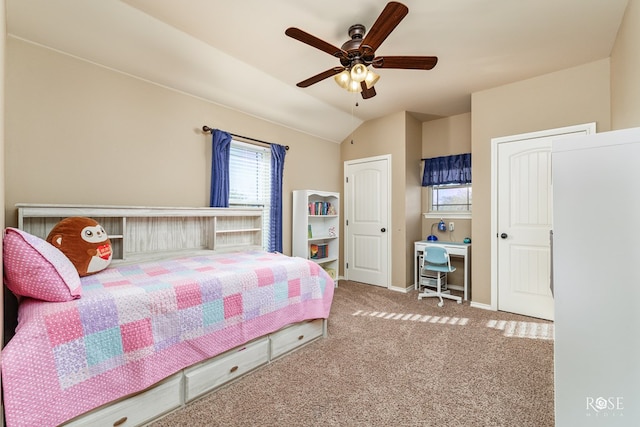 bedroom with carpet, lofted ceiling, and ceiling fan