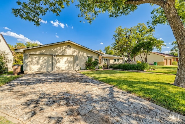 single story home with a garage and a front yard