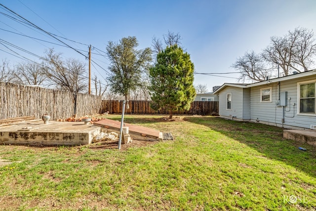 view of yard featuring a fenced backyard